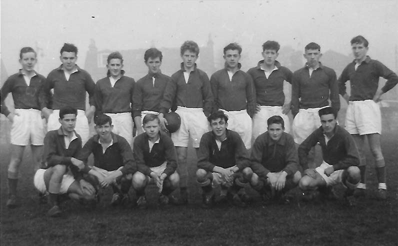 Rugby Team 1st XV 1959-60.jpg - Rugby Team 1st 1959-60. Before or after playing Holy Cross where they won 17-0 at home and 17-3 away.Back- J Hunter, P Martin, J Murdoch, P Nicol, J Regan, E Archibald, R Macari, J Hunt, M Sexton. Front- D Lanbery, D ANderson, J Clarke, L Cassisdy, E Jones, J Broadley.